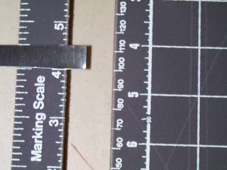 Half-inch wide strip of flashing, to be turned into aiguillette blanks